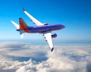 Southwest Airlines Plane Above The Clouds Wallpaper