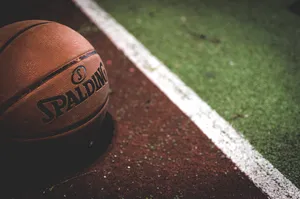Spalding Basketball Ball Red Green Field Wallpaper