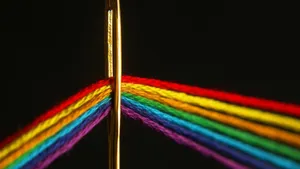 Spectrum Threads On Needle Wallpaper