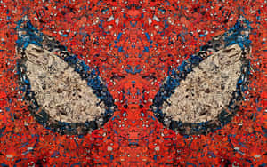 Spider - Man's Face In Red And Blue Paint Wallpaper