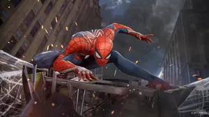 Spiderman Vigorously Battling Enemies In The Battlefield Wallpaper