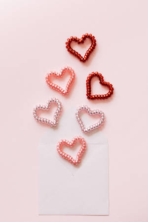 Spiral Pastel Pink Heart Hair Ties Wallpaper