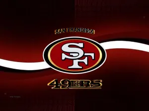 Spirited 49ers Fans Cheering In A Packed Stadium For Their Favorite Team Wallpaper