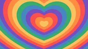 Spread Some Love With A Beautiful Rainbow Heart Wallpaper