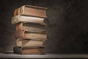 Stack Of Old Dictionary Books Wallpaper