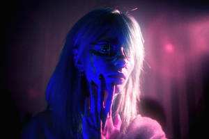 Standing Out In The City With A Purple Aesthetic Wallpaper