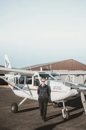 Standing Woman Small Airplane Wallpaper