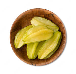 Star Fruit In Wooden Bowl Wallpaper