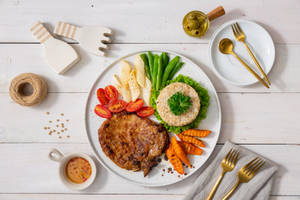 Steak And Veggies Lunch Meal Wallpaper