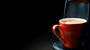 Steaming Red Coffee Cup Wallpaper