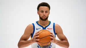 Stephen Curry 4k Holding Basketball With Both Hands Wallpaper