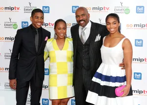 Steve Harvey Enjoying Quality Time With His Family Wallpaper