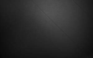 Stitches On Black Leather Wallpaper