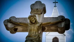 Stone Sculpture Of Jesus On Cross Wallpaper