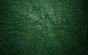 Striking Shimmer Of A Green Leather Texture Wallpaper