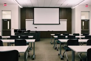 Students Engaged In Active Learning In A Modern Classroom Wallpaper
