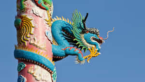 Stunning Blue Dragon In Flight Wallpaper