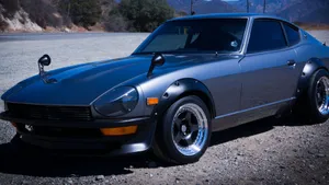 Stunning Datsun Car In Action Wallpaper