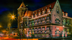 Stunning Night View Of Gemeentehuis Town Hall In The Netherlands Wallpaper