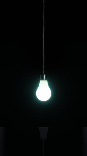 Stunning Oled Hanging Light Bulb In Dim Environment Wallpaper