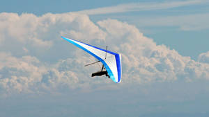 Stunning View Of Hang Gliding Adventure Wallpaper