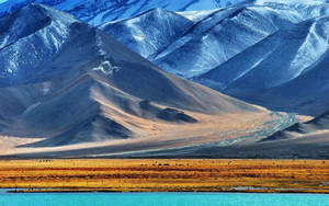 Stunning View Of Iskanderkul Lake In Tajikistan Wallpaper