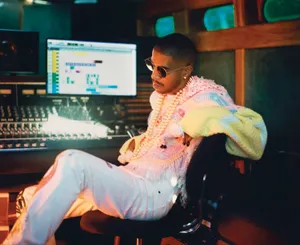 Stylish_ Artist_in_ Recording_ Studio Wallpaper