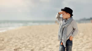 Stylish Boy At The Beach Wallpaper