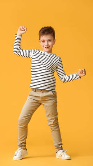 Stylish Boy On Yellow Background Wallpaper