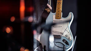 Stylish Light Blue Guitar Wallpaper