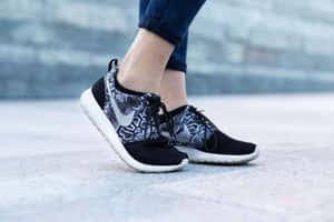 Stylish Woman Wearing Nike Roshe One Winter Sneakers Wallpaper