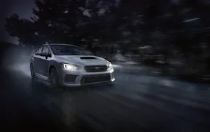 Subaru Driving Under The Rain Wallpaper