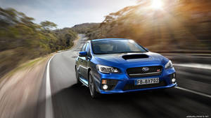 Subaru Impreza Speeding In Road Wallpaper