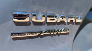 Subaru Logo Text On Car Wallpaper