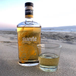 Suerte Gold Anejo Tequila Wallpaper