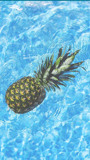 Summer Fun Pineapple In A Pool Wallpaper