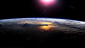 Sun Lights Up Earth Wallpaper