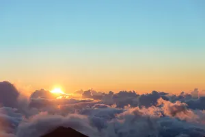 Sunrise Above Clouds Wallpaper