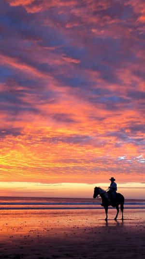 Sunset By The Beach Cowboy Iphone Wallpaper