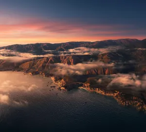 Sunset On Huge Island Macos Wallpaper