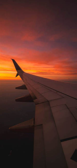 Sunset With Wing Of Airplane Android Wallpaper