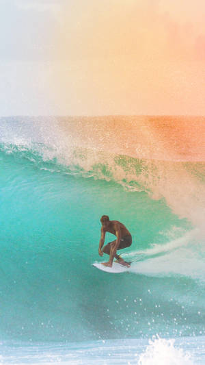 Surfing Orange And Blue Hues Wallpaper