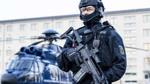 Swat Cop Officer With Helicopter In Germany Wallpaper