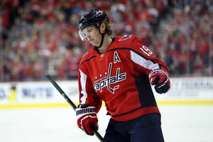 Swedish Athlete Nicklas Backstrom Game Against Carolina Hurricanes Wallpaper