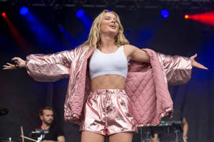 Swedish Pop Sensation Zara Larsson Performing At Lollapalooza Wallpaper