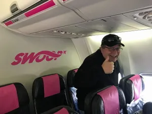 Swoop Airlines Happy Passenger Wallpaper