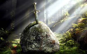 Sword In Stone Under Sunlight Wallpaper