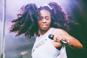Sza - The Prolific Artist Wallpaper
