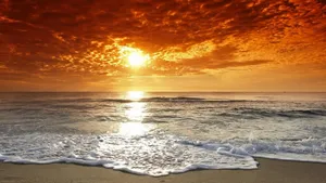 Take A Peaceful Break In Front Of A Beautiful Beach Wallpaper