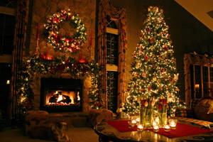 Tall Christmas Tree By The Fireplace Wallpaper